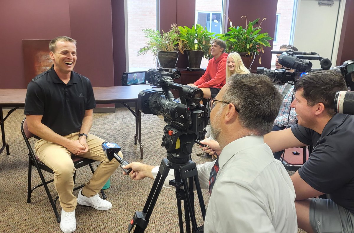 Aurora Middle School math teacher Scott Phillips talks to reporters after being named 2024 Nebraska Teacher of the Year.