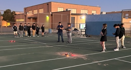 CTE students in the Robotics program at Bonham Middle School learned about real world applications of drone technology. Two drones flew multiple routes to collect data on traffic flow around the campus and the football field. Students will analyze and review the data in class.