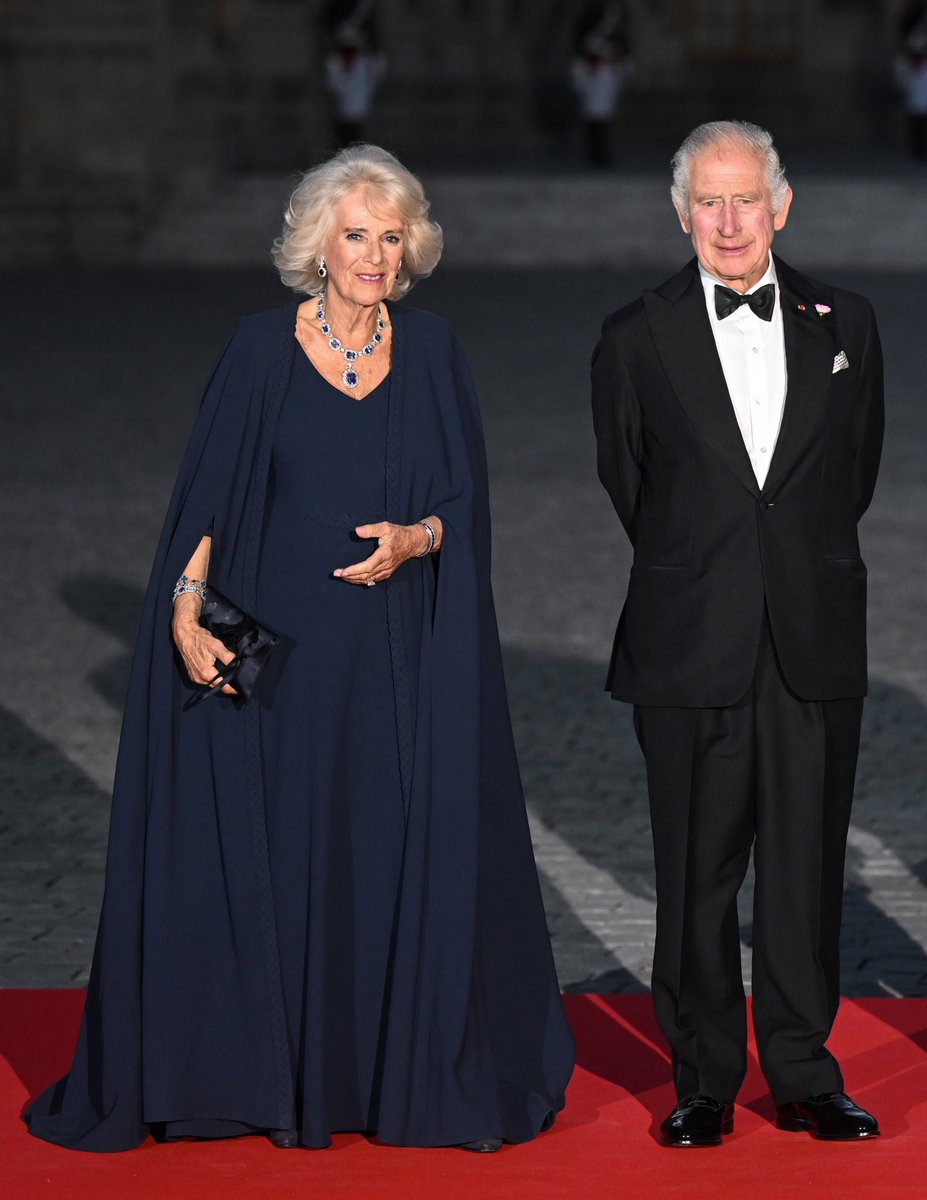 A regal appearance.
For the state dinner held this evening at the Château de Versailles, Queen Camilla appeared in an exquisite #DiorCouture evening gown and cape in midnight-blue silk crepe specially dreamed up by Maria Grazia Chiuri, a masterpiece epitomizing #DiorSavoirFaire.