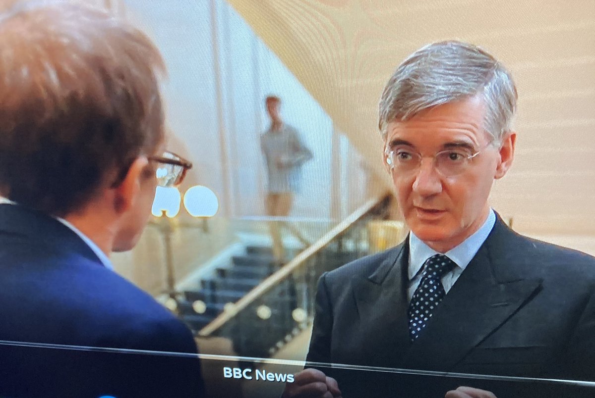 nonwatcyn's tweet photo. Did I see a guy without trousers on at the top of stairs during Rees-Mogg’s interview on @BBCNews - #mindboggles 😳 ah well each to their own 🤓 https://t.co/moqMUinxqE