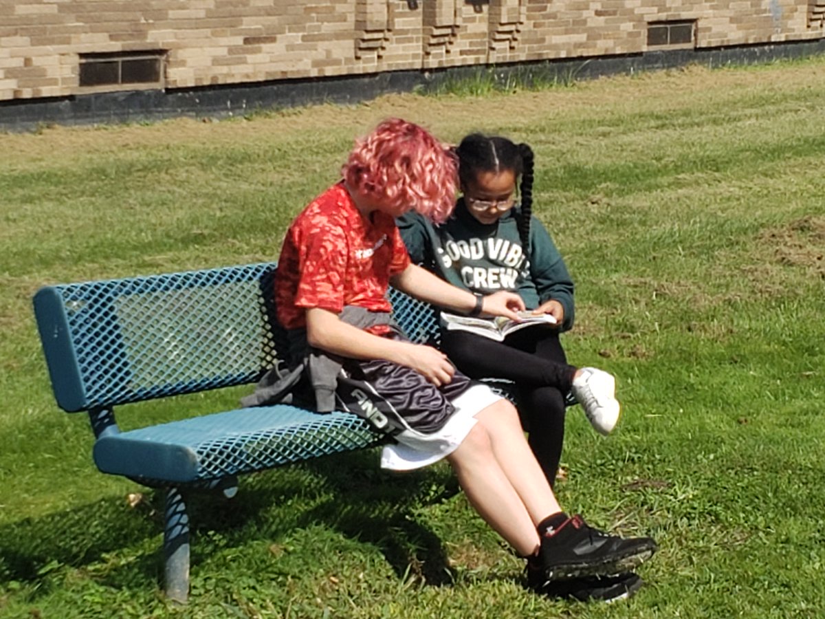 NRCSRangers's tweet photo. Start with Hello Week at RHTA included buddy reading between the learners in grades 2 &amp; 3 and those in grades 7 &amp; 8.  It was a beautiful day to find a spot in the sunshine (or the shade) and share a story. 
💚📖☀️ https://t.co/8pb52BcD3g