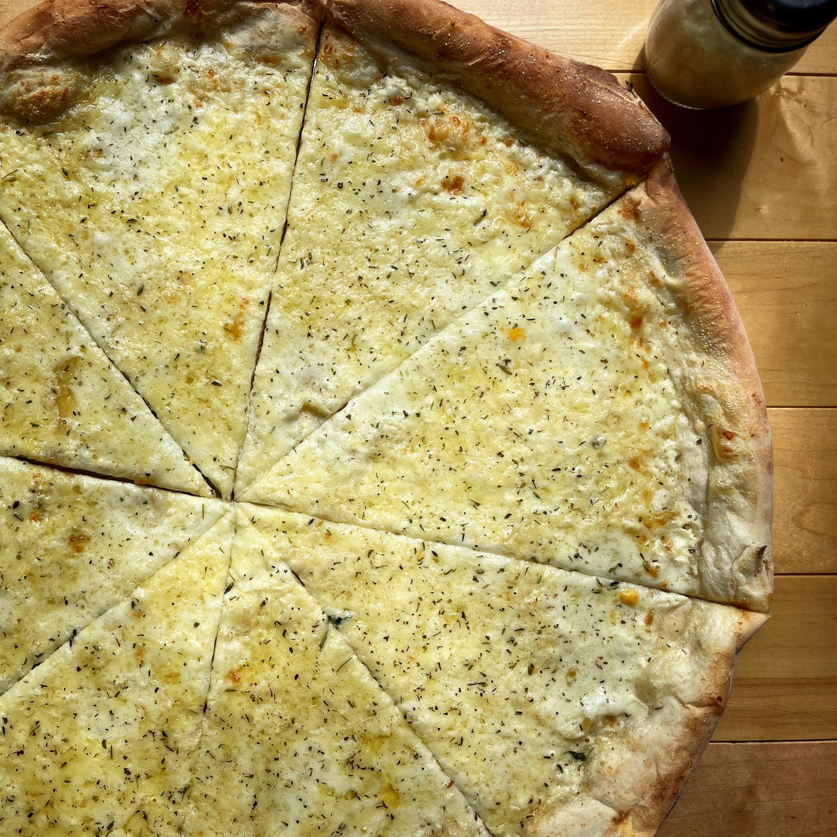 Mozzarella! Gruyère! Parmesan! Asiago! Meet your cheesy, herby-crema weekly special, 𝟰 𝗖𝗵𝗲𝗲𝘀𝗲! Now available and waiting for hungry pizza lovers everywhere! #IansPizza
