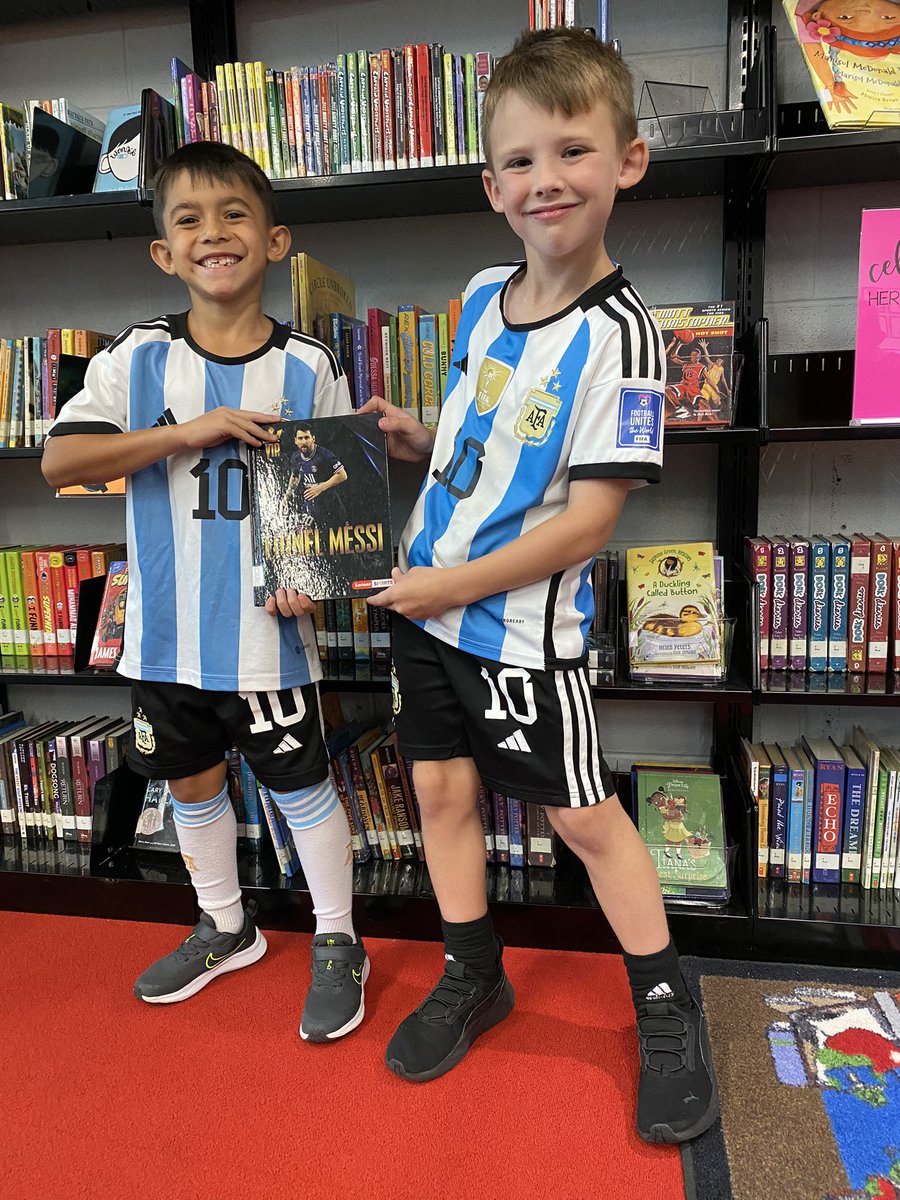 Our students love finding books that match their interests! Look at these two Messi fans and the awesome biography they are excited to read! #RemarkableRedClay <a href="/RCCSDLibraries/">RCCSD Libraries</a> <a href="/RedClaySchools/">Red Clay Consolidated School District</a> <a href="/CookeCardinal/">Cooke Elementary</a> <a href="/LernerBooks/">Lerner Books</a>