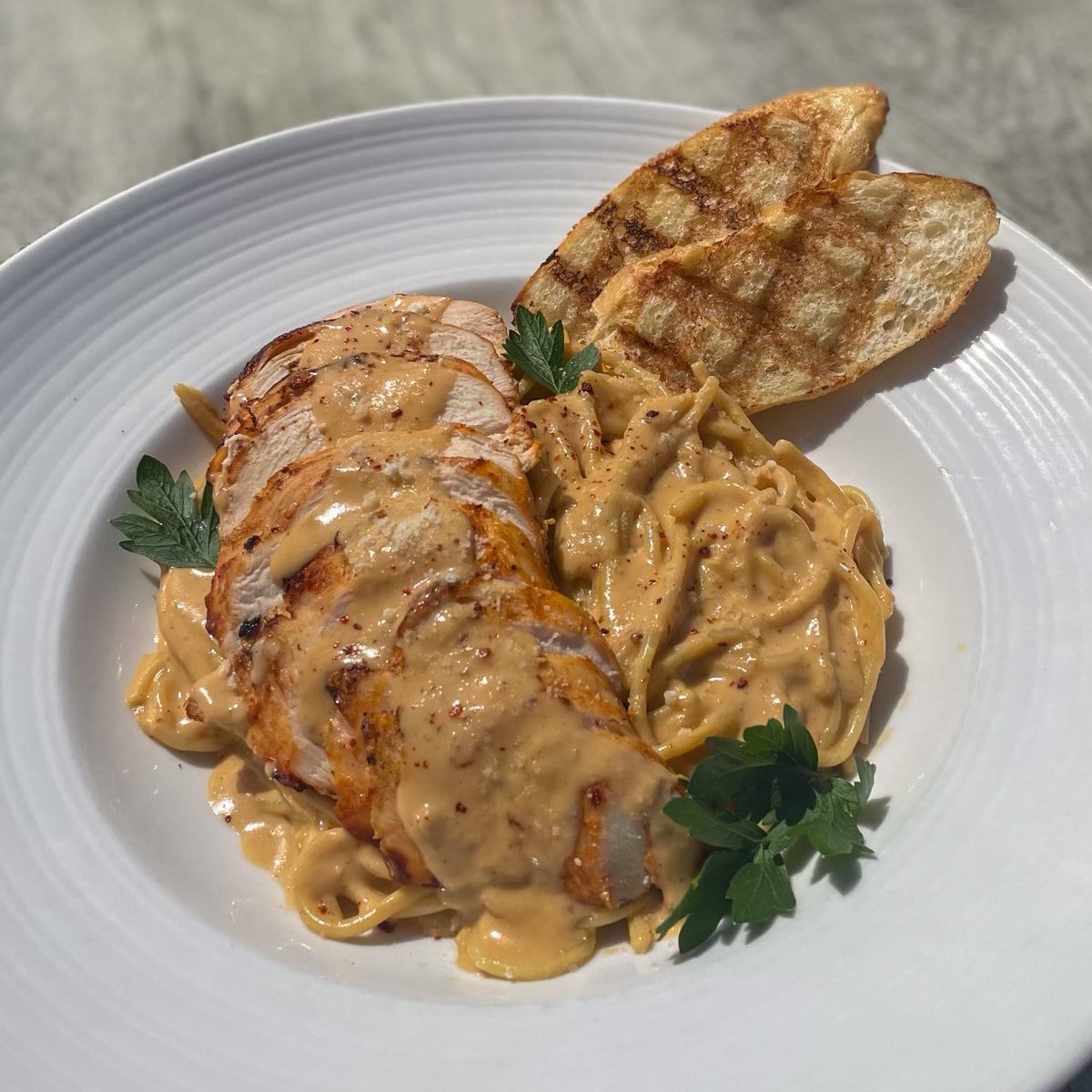 JT_Schmids's tweet photo. Our Chipotle Chicken Pasta special is pure perfection! 🙌 Enjoy tender grilled chicken with chipotle cream sauce and cotija cheese. https://t.co/znsPYxfUgi