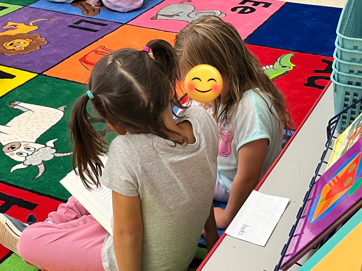 CStuetzFM's tweet photo. Readers sit side by side with a book in the middle and read with a partner! @FoxMeadowSchool #scarsdalepride https://t.co/nJ7cmBEO3s