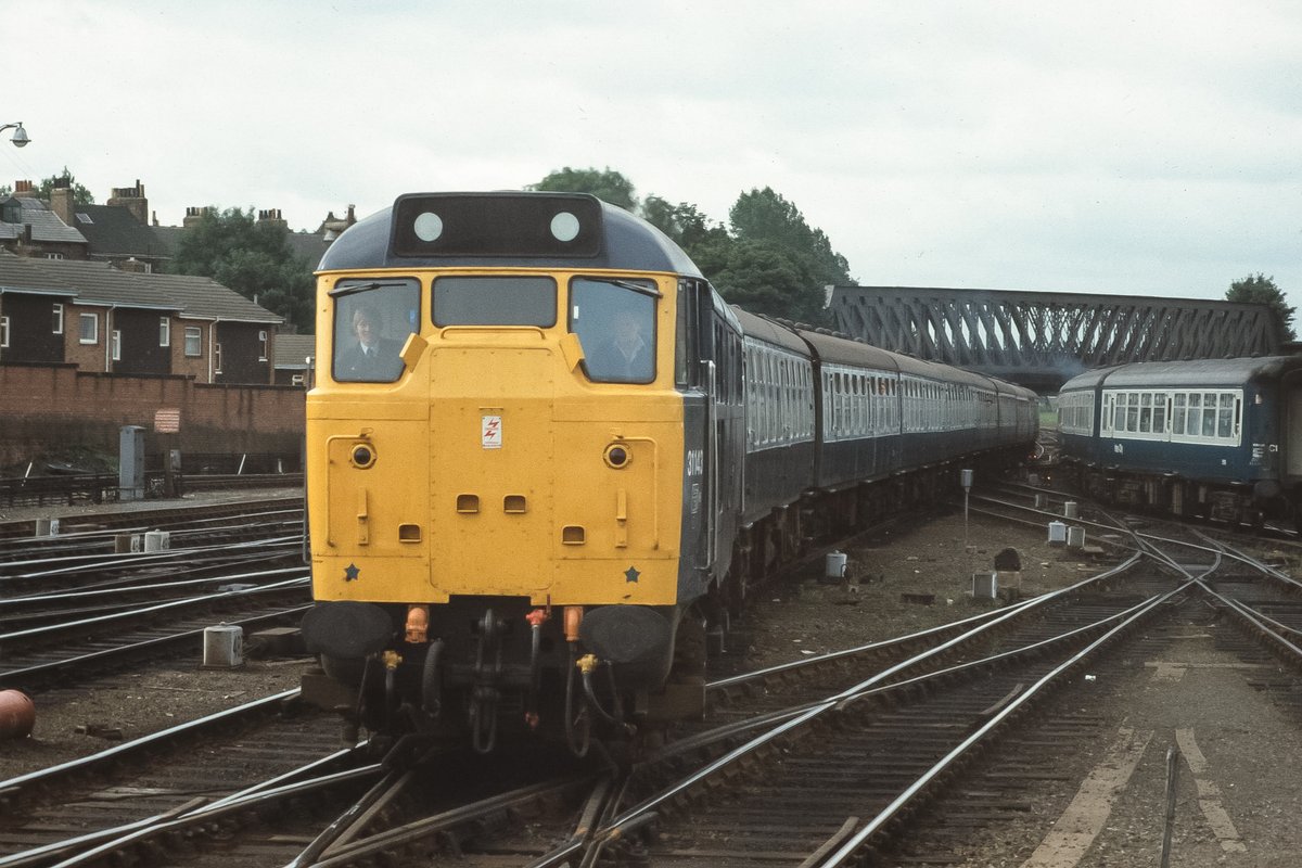How we used to travel to the seaside - 31143 with a decent load (at least 8 Mk. 1's) arrives at York with 1L18, the 0915 Chesterfield - Scarborough, on Saturday 22nd August 1981.
#ThirtyOnesOnThursday