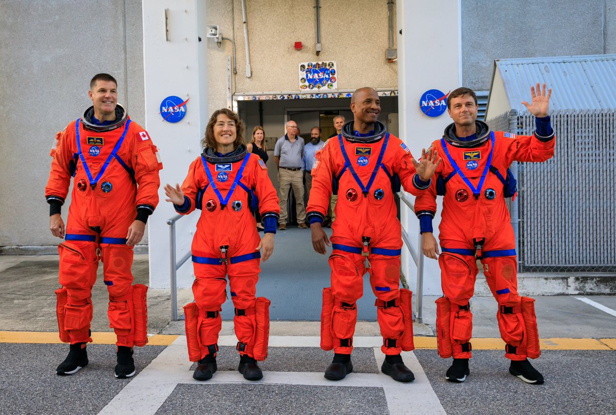 The Artemis II astronauts pose outside the Neil Armstrong Operations and Checkout Building during an integrated ground systems test! 📸: NASA