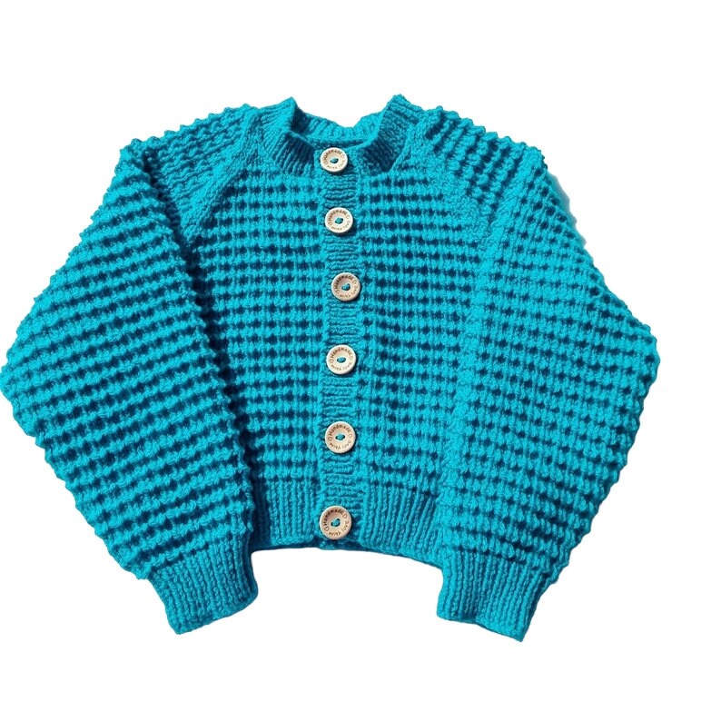 Girls or boys azure blue cardigan with all over stripe textured pattern etsy.me/44NVFnX #knittingtopia #etsy #knittedcardigan #girlscardigan #boyscardigan #childrensknitwear #handmade