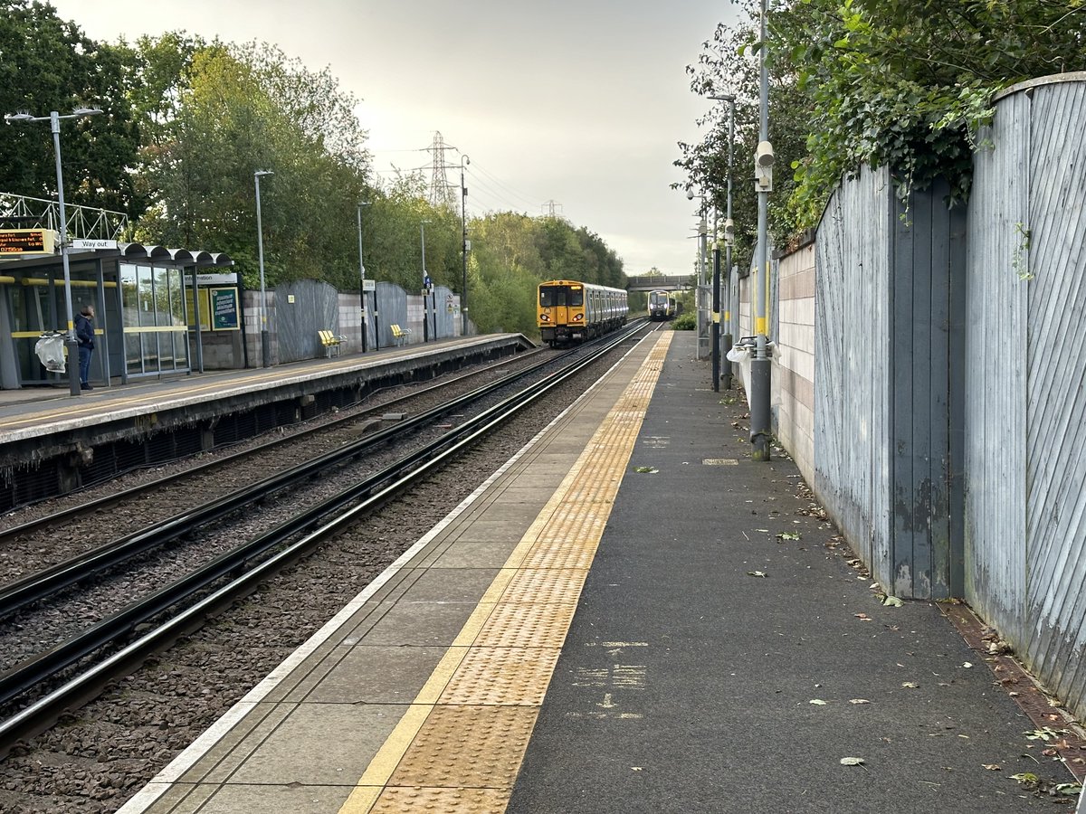As an old @merseyrail train leaves, a new one arrives, at Eastham Rake Railway Station.