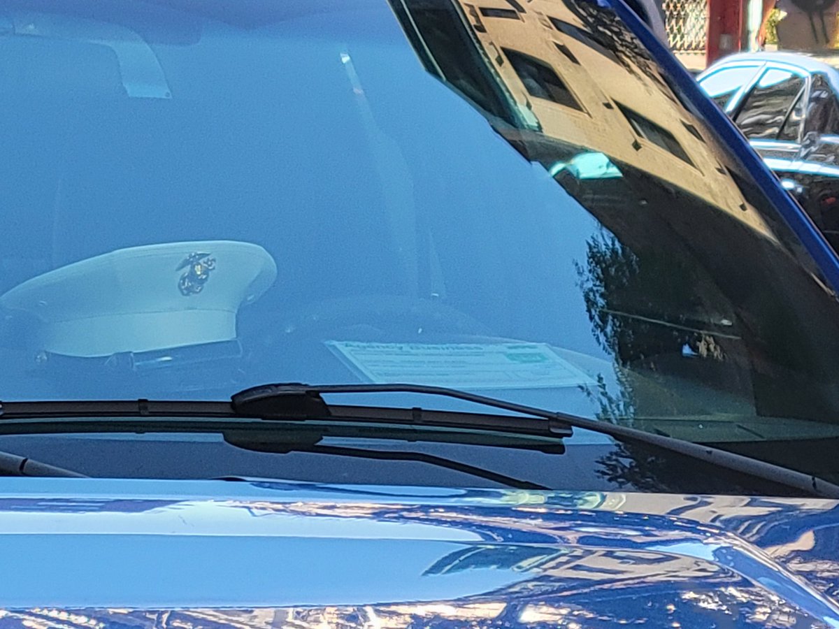 placardabuse's tweet image. Here was somebody misusing their #FancyHat and an expired @USMC placard that was issued for use on government vehicles to illegally park their personal truck in a No Standing zone during rush hour.

That location is still illegal even with a valid permit.

#PlacardCorruption