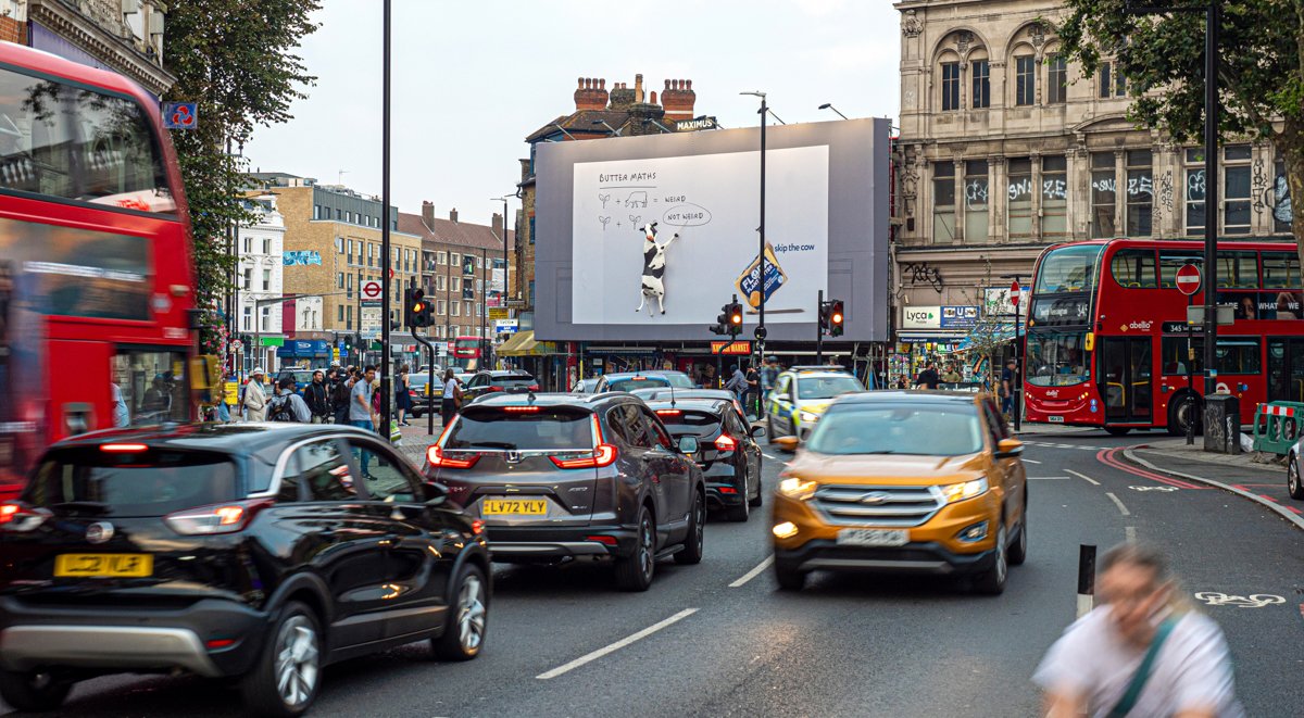 maximusmaximise's tweet photo. There’s no butter format than out-of-home!

Butter brand @Flora  brought its ‘Skip the Cow’ campaign to life on our Pride of Peckham mega banner in its latest tongue-in-cheek campaign. @Posterscope @dentsu_global 

#OOH #outofhome #advertising #megabanner https://t.co/3YbsSSlCxP