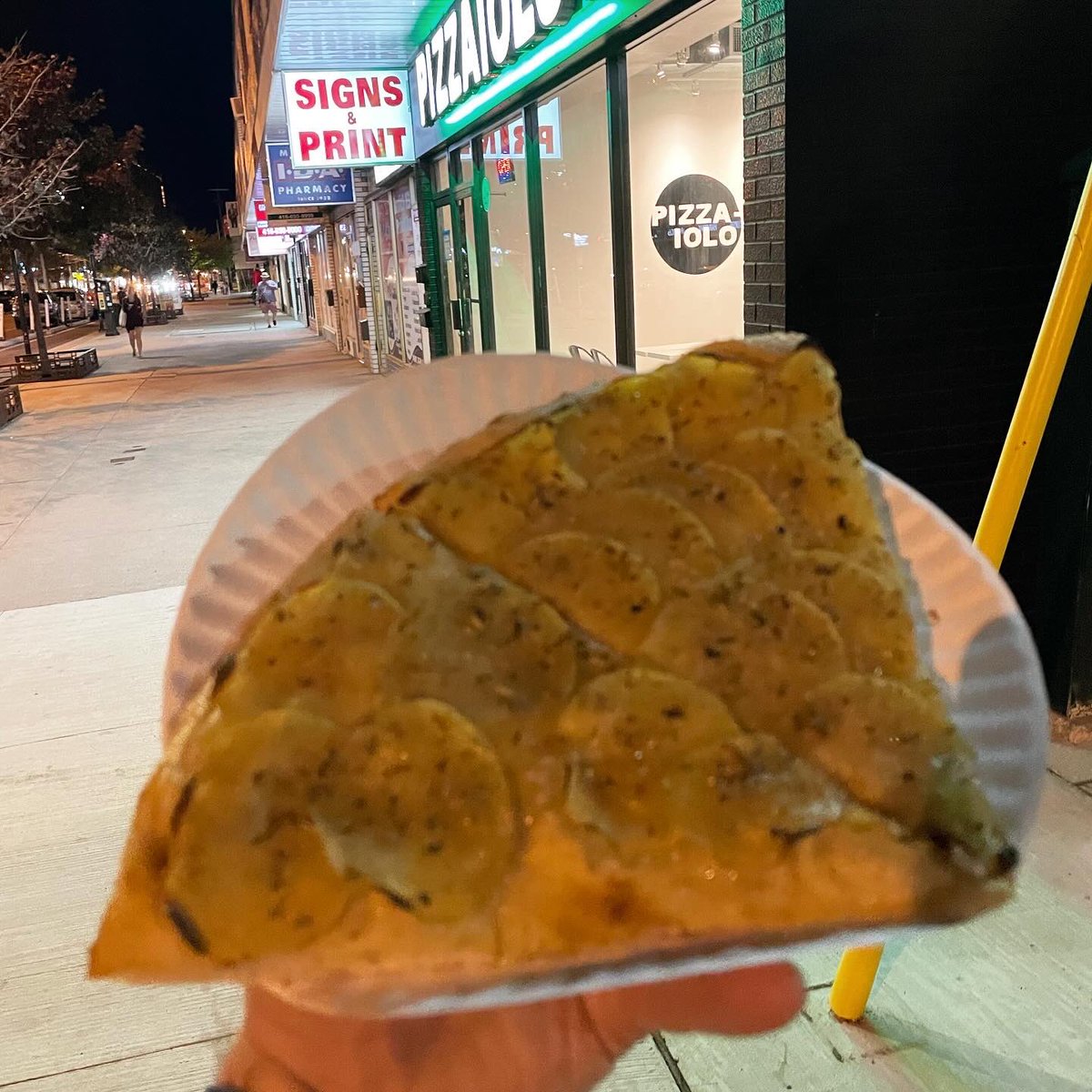 We are eating on the streets in the east end of Toronto at one of #Pizzaiolo's newer locations in #DanforthVillage. This spot used to be called Sunshine Restaurant and had a pool table in it that I'd visited before back in the 'bar' days. I don't ever recall eating anything