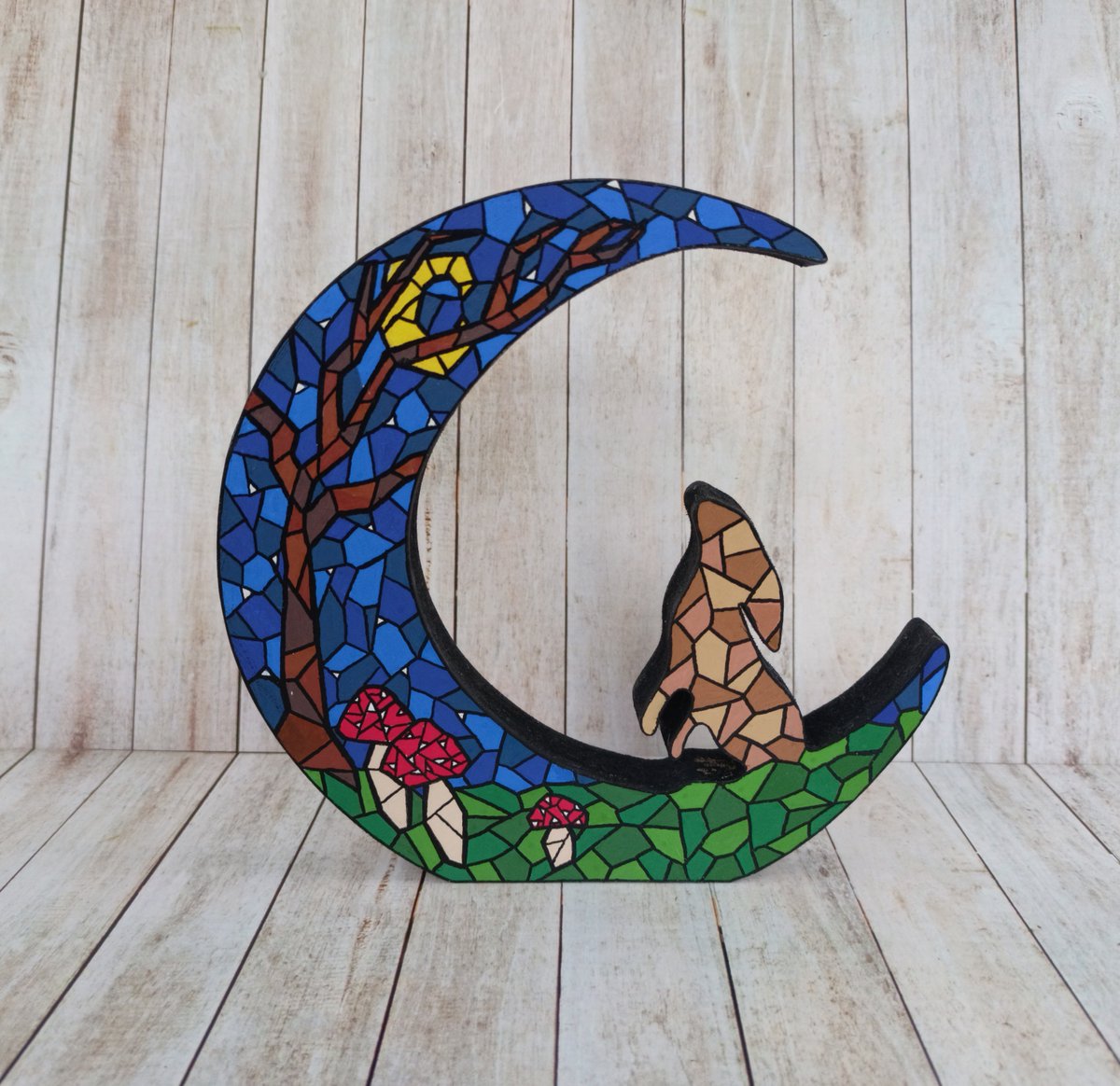 New in my @BritishCrafting shop! This moongazing hare ornament is painted with a stained-glass mosaic effect and features a little brown hare looking at a crescent moon :) #newontbch #Moongazing #hare thebritishcrafthouse.co.uk/product/moonga…