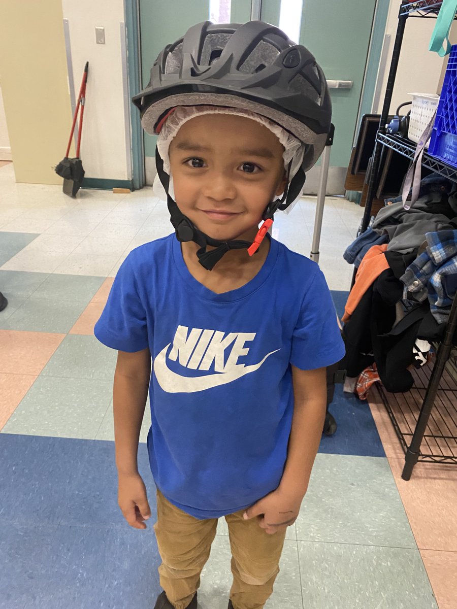 My friend at Bunker Elementary helping me demonstrate a helmet fitting.