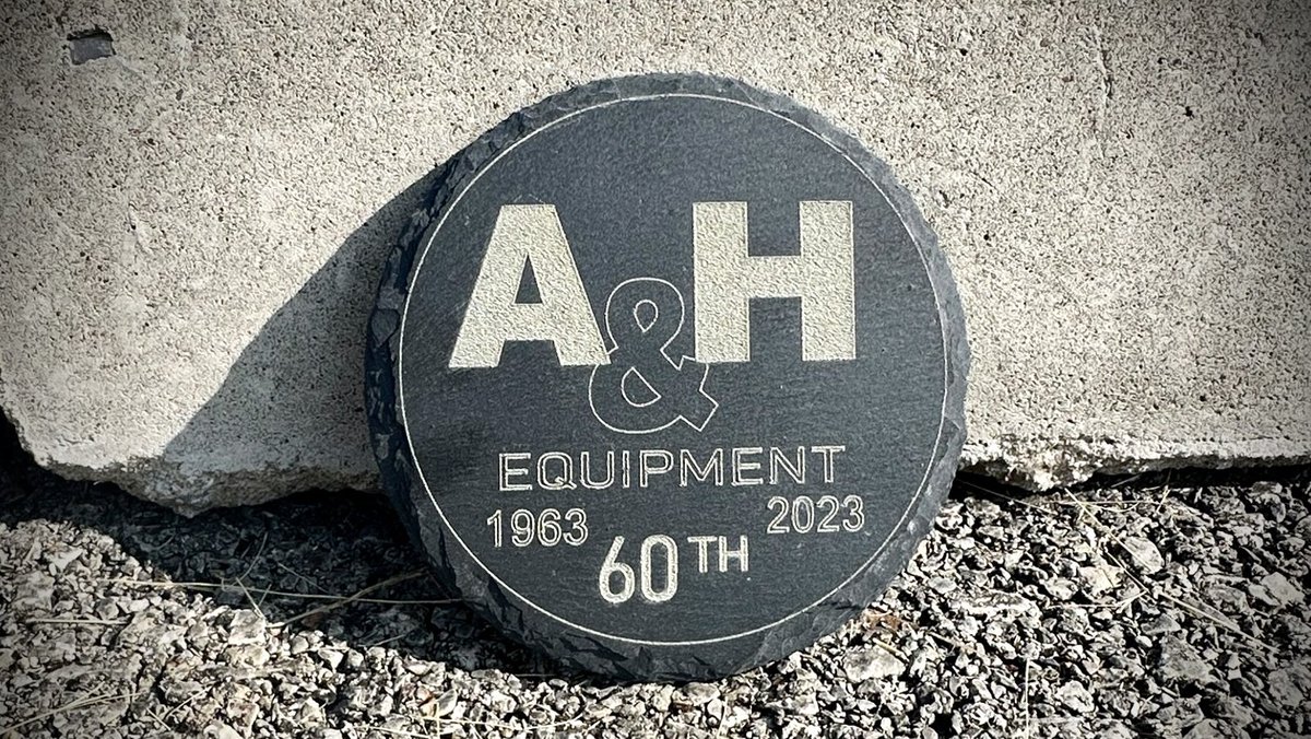 Compliments to A&H Truck Driver, Tom Leech, for designing these amazing 60th Anniversary slate laser engraved coasters!! We love to represent the talent of our employees! 
#ahequipment #60thanniversary #laserengraving #thankyou #employees #solutionsyoutrust  #cheerstoanother60