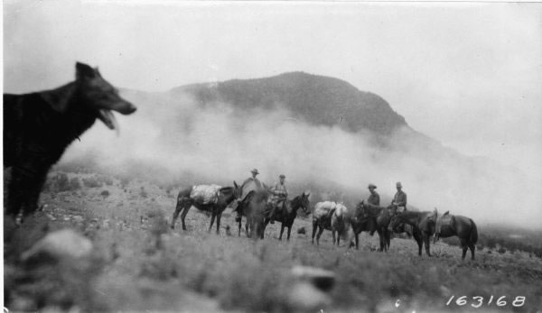 TontoForest's tweet photo. #tbt to a 1921 photo depicting Forest Ranger Officers surrounded by "scotch mist" in the Mazatzal Wilderness Area. The officers are Messrs, Sizers, Croxen, Stewart and James. Photographer was the #TontoNF Forest Supervisor at the time.

Name of pup? Good boy.
#WildernessMonth https://t.co/gNLxa0YROQ