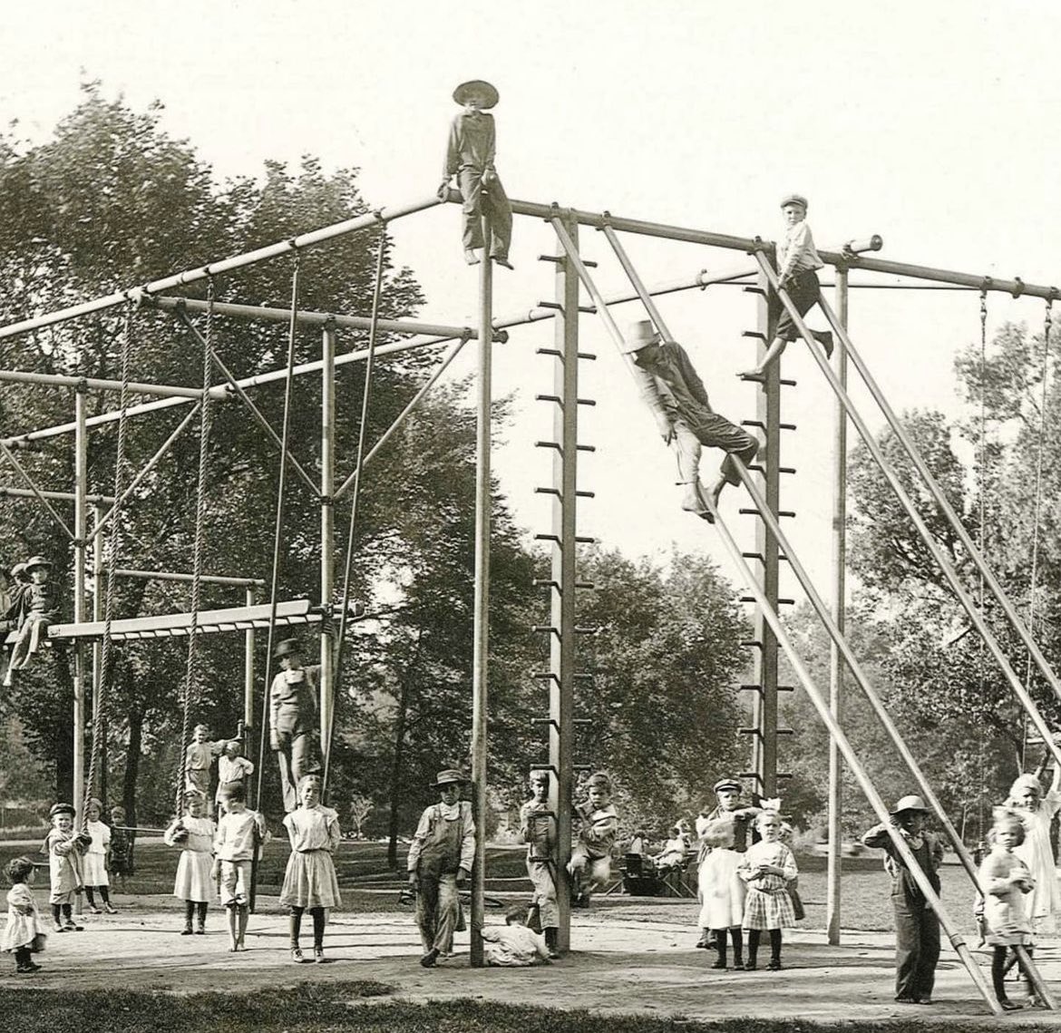historyinmemes's tweet image. In the early 1900s, an early playground made of metal was constructed 12 feet above concrete floors in Cedar Rapids. Prior to the concept of structured playgrounds, children played wherever there was space, including empty lots, rural fields, the woods, and even in the streets.…
