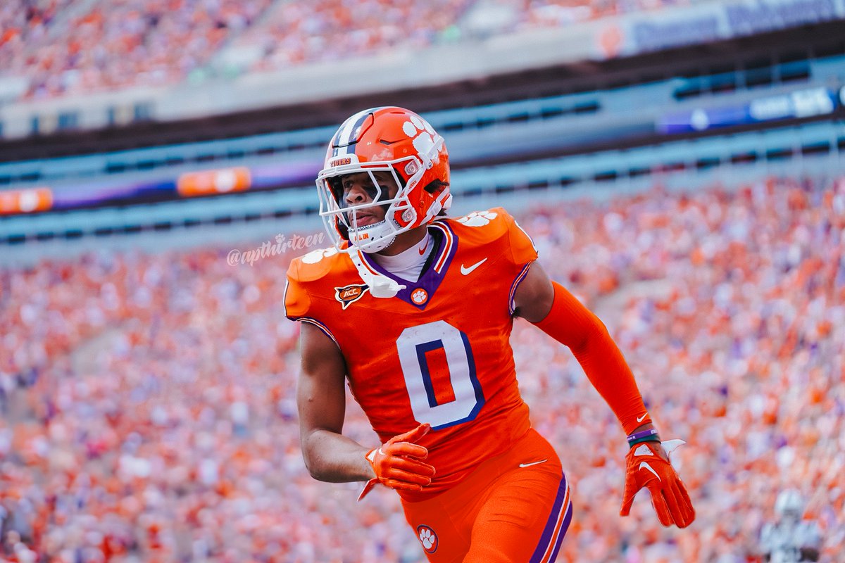 apthirteen's tweet photo. 20 years ago, unranked Clemson upset #3 Florida State in a magical evening in Death Valley.

Here's what it would look like if the Tigers brought back the uniforms and end zones from that game this Saturday. https://t.co/QDySOcl7ER