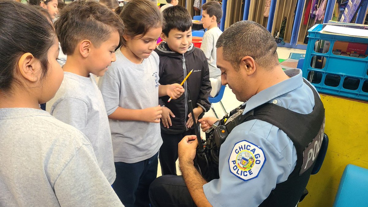 Our officers in <a href="/CPD_CST/">CPD Citywide Community Safety Team</a> joined St. Pius V school located in the @chicagocaps12 for a prayer for International Peace Day. Officers and students stood in front of the school cheering  on cars to honk their horn to indicate unity &amp; peace.