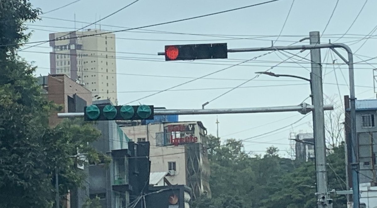 Which genius decided to wrap the new signal lights in green plastic? 🤔