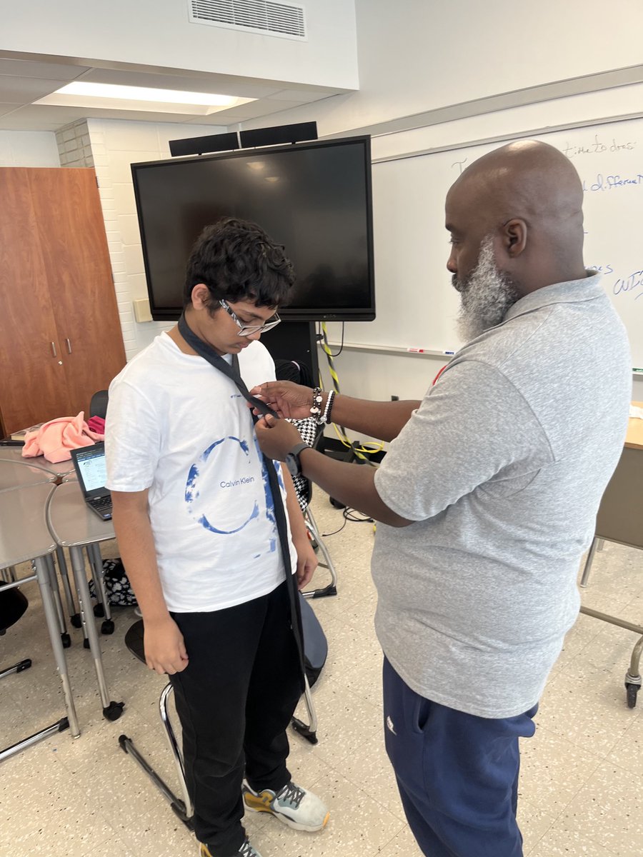 WoodlawnHS_BCPS's tweet photo. Thank you to the staff who supported our CTE students today, ensuring each student learned how to tie a necktie in preparation for our Dress for Success days.  Kudos to Ms. France for creating the opportunity to collaborate and connect.  ⁦@KHarrisSimms⁩ https://t.co/gzinG05XZf