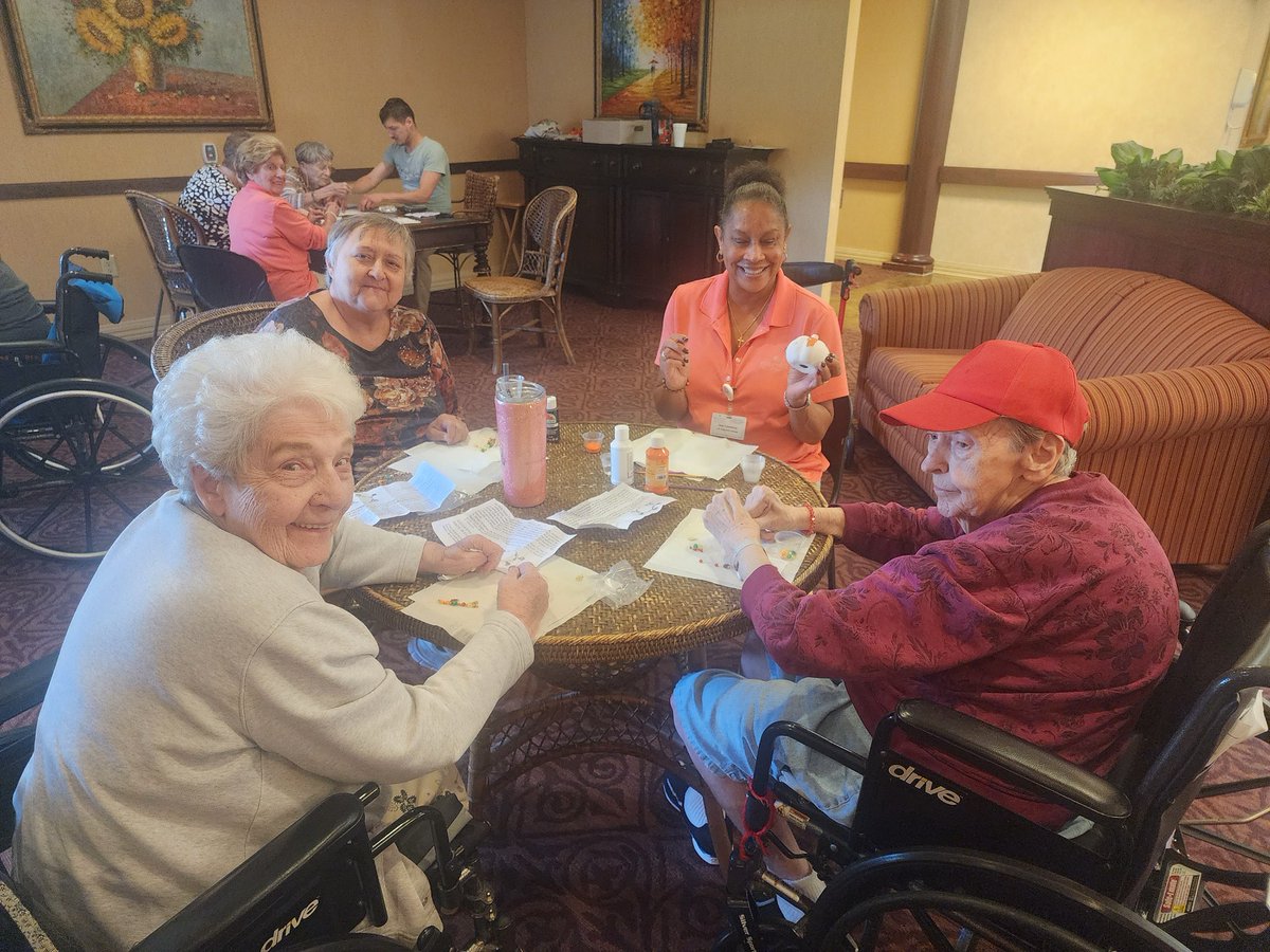 Our residents enjoying making Fall bracelets for Artisans  followed by a game of bingo