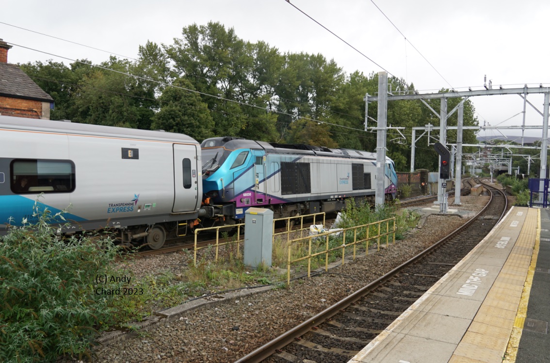 Two photos I took from the same position at Stalybridge more than 35 years apart (unhelpfully cropped on the previews). 68030 today and 47413 with the 1503 Liverpool-Newcastle on 16 April 1988. SYB is full of unphotogenic clutter now. #class47 #class68