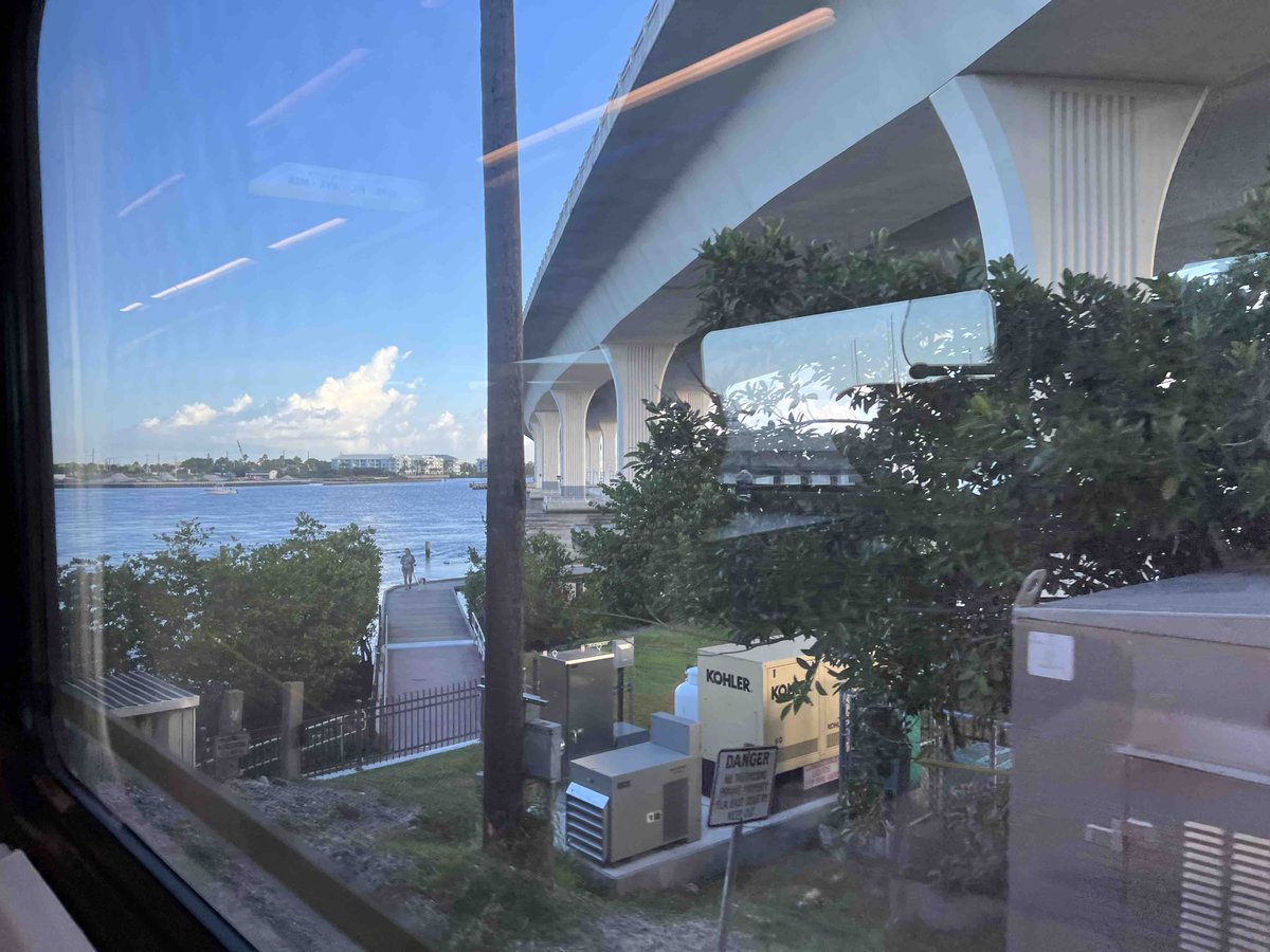 Editor_SeanMC's tweet photo. There are moments where you appreciate going slower, on which the #Brightline train obliged, such as going over bridges. Now slowing again as we near the first stop in West Palm Beach, 2 hours after leaving Orlando. #OBJBrightline https://t.co/3mQLn2xLW0