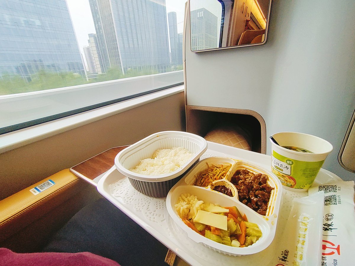 nonstopeurotrip's tweet photo. I've just been on the BEST train in the world, there is now no doubt in my mind... The Fuxing CR400 is INSANE 🚄 The ride, food, comfort & SPEED! China has really amazed me today, just look at that seat! 🇨🇳 Now I understand @DavidFengTrains ✌🏻#China #NonstopEurotrip https://t.co/n5xXKzBxfx