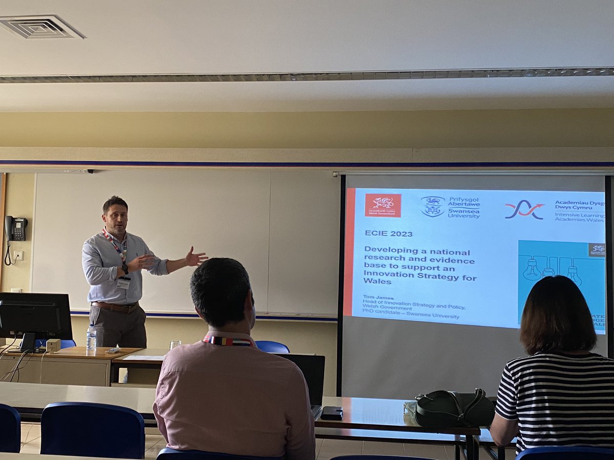 Fantastic presentation by <a href="/innovation_tom/">Tom James</a> on behalf of our teams paper on the development of the health chapter of the  New Welsh Innovation Strategy @SoMSwansea  at <a href="/acpi_tweets/">ACPI</a> ECIE 2023 conference in Porto, Portugal #innovation #strategy #wales