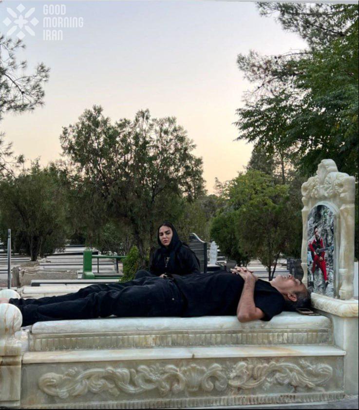 ItsDecado's tweet photo. Heart-wrenching to see the parents of #MatinNaderkhani at his grave. Imagine holding your child's dreams, only to be left holding onto their memory. Matin, a beacon of hope as Damash's goalkeeper, became a martyr for freedom. How many more dreams must be buried? 
💚🤍🦁🌄🤍♥️ 
#IRGCterrorists
