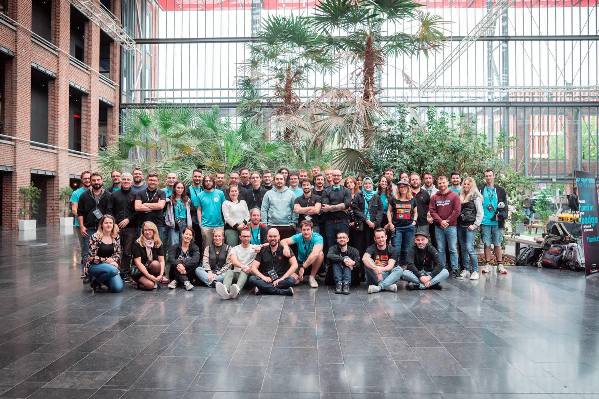 Group of people posing for a picture.