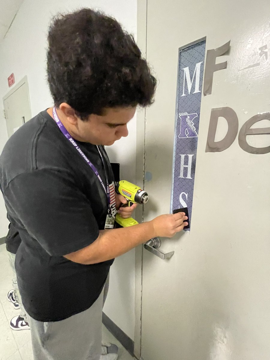 KropCTE's tweet photo. No down time here, our Communications Technology students are already hard at work! Wrapping every class room window in our school with 50/50, printed, one way window perf. You can only see out, not in. Academy students designed, printed, uv coated, cut, and installed the wraps! https://t.co/ShByD19501