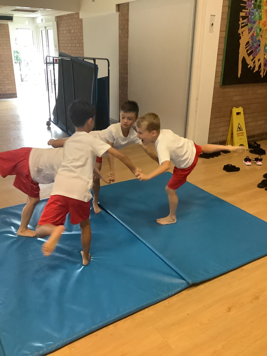 StPhilipsY3C's tweet photo. We are loving PE this half term! In gymnastics, we have been learning how to make different shapes with our bodies using balancing. Take a look at some of our fantastic partner balances. @StPhilipCEAP #teamStPhilips https://t.co/MdrofjdThE