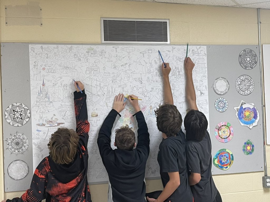 Working collaboratively on our class world map in grade 7/8.  Five dollars at dollarama <a href="/CedarlandSchool/">Cedarland School</a>  #teamwork #collaboration <a href="/GEDSB/">Grand Erie District School Board</a>