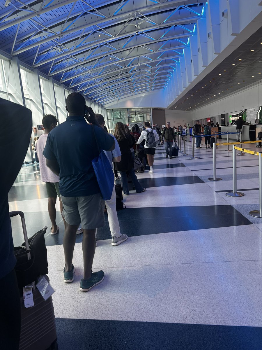 Um… so this is the current line to pick up a reserved car <a href="/Budget/">Budget Car Rental</a> in <a href="/CLTAirport/">CLT Airport</a>. My count has it at more than 100 people in line and 3 people behind the counter. How is this even possible?