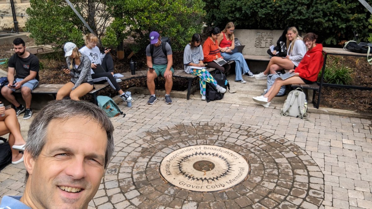 Teaching tornadoes and hurricanes in  Intro Physical Geography outside around a circular object