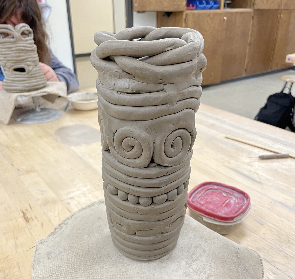 lps_visualart's tweet image. Lincoln Northeast Pottery students are using the coil method to create unique vessels.