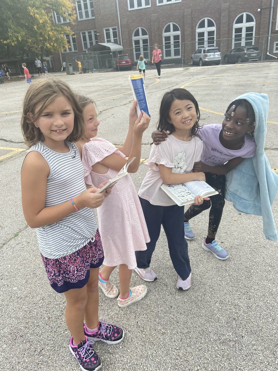 Sweet Unit B girls brought field guides to recess to go birdwatching.