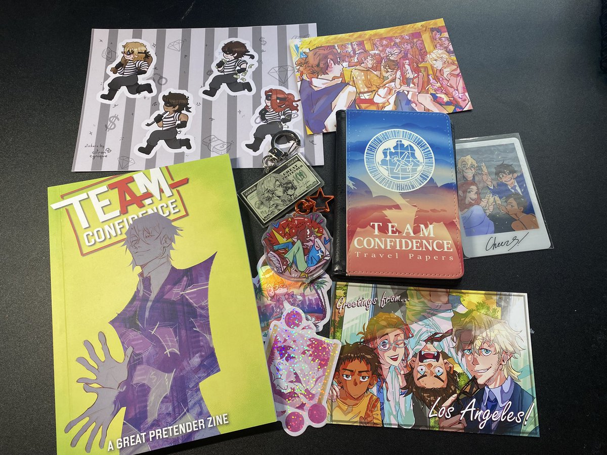 telliefilm's tweet photo. The @TeamConfidence_ zine has shipped and it’s finally here!! So so so thrilled to be able to see all this lovely artwork. How cool to see more art of The Great Pretender. Such a wonderful anime and such a delightful zine and merch. https://t.co/qtNSMhxPs0
