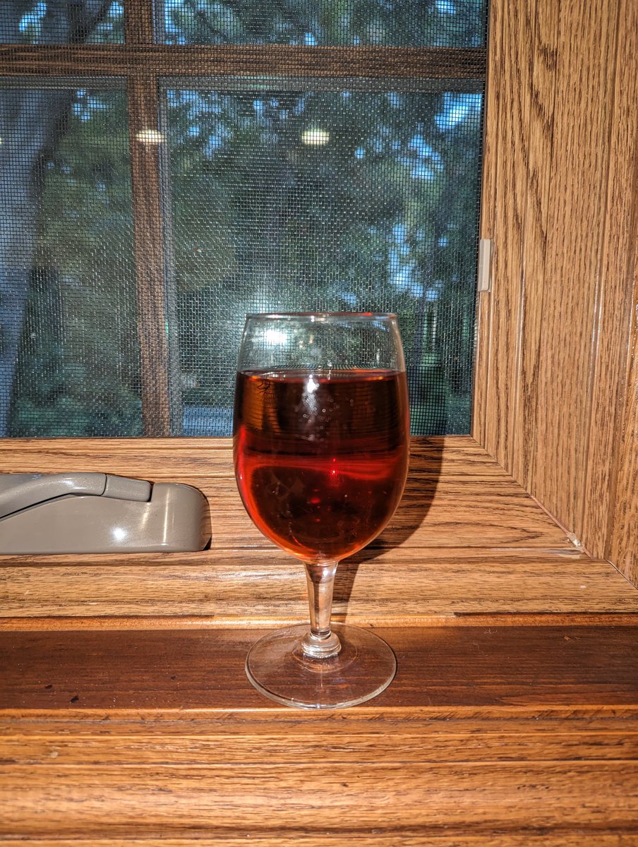 Rose hip wine, 12 months in bulk aging. Tastes great, doesn't taste alcoholic but obviously is. #homebrew bottled now for thanksgiving gifts.