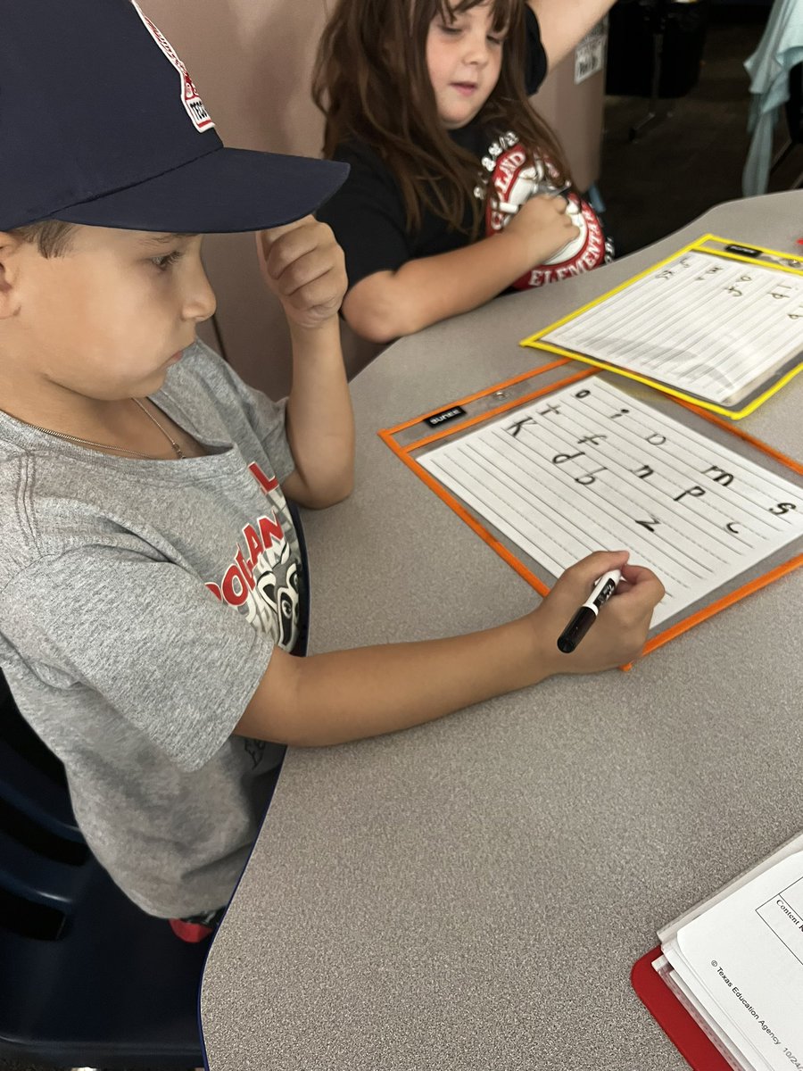 HumbleISD_WHE's tweet photo. It’s hard to not be distracted when the principal observes on crazy hair day, but Mrs @firstwithbrooks  class did an amazing job during their UFLI lesson! @Humble_ElemELA https://t.co/xEoCSt1FvA