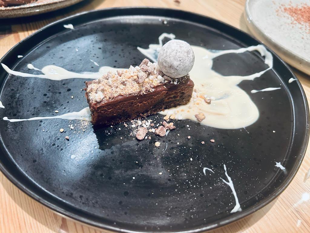 Dark chocolate torte - caramelised chocolate mousse, white chocolate honeycomb, champagne truffle