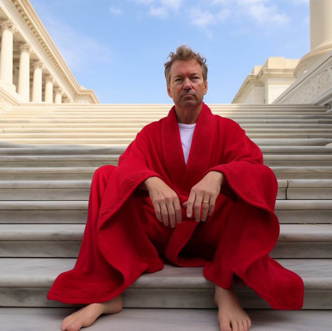 Breaking: Senator Rand Paul showed up to work at the Capitol barefoot wearing a red bathrobe after the Senate changed the dress code to accommodate for John Fetterman.