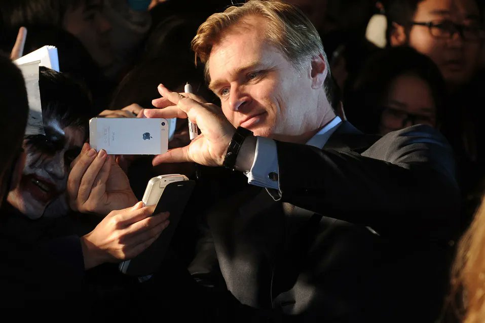 NolanAnalyst's tweet photo. Christopher Nolan explains how he stays informed despite not having a smartphone:

“I actually do read the newspaper every day. Yes, the physical newspaper. No, I go online plenty, probably more than I would like. But I do it at a computer in my office. You know, I don't like to be distracted during the day overly. So I don't carry a smartphone with me and all the rest. But I know I stay very informed as much as I can, you know, through traditionnal media, through online as well. 

But I don't do any social media or anything like that. I try not to get too bogged down in the process of feeling connected with the world. It doesn't really take long to, you know, get up to speed on the news of the day. You don't need to spend your entire existence doing it. And I'm very easily distractible, so it's better for me to put that in a box and have a particular period of time where I'm paying attention to what's going on outside world. 

And then I need to focus on the thing it is that I'm doing. And so when I'm making a film, I very much get into a bubble and don't keep in touch with what's going on in the world. But that's sort of the job, really. I mean, I'm being paid or being entrusted with a budget. And I'm being given the responsibility of focusing entirely on this particular film while I'm making it. That's my job.”