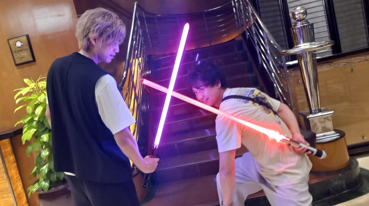x_pacaud's tweet photo. Photo from Mike Atienza. Our teammates from @tokuspiri brought lightsabers for Ryota and Masahiro to play around with in photos on their last day in the PH https://t.co/pNxxx18EH5