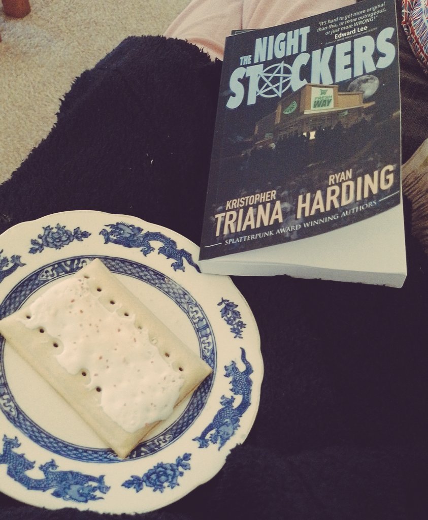 Just started reading another book by <a href="/KoyoteKris/">Kristopher Triana</a> and #RyanHarding. Perfect way to start my Saturday I feel. #SaturdayMorning #readingforpleasure #breakfast #amreading #HorrorCommunity