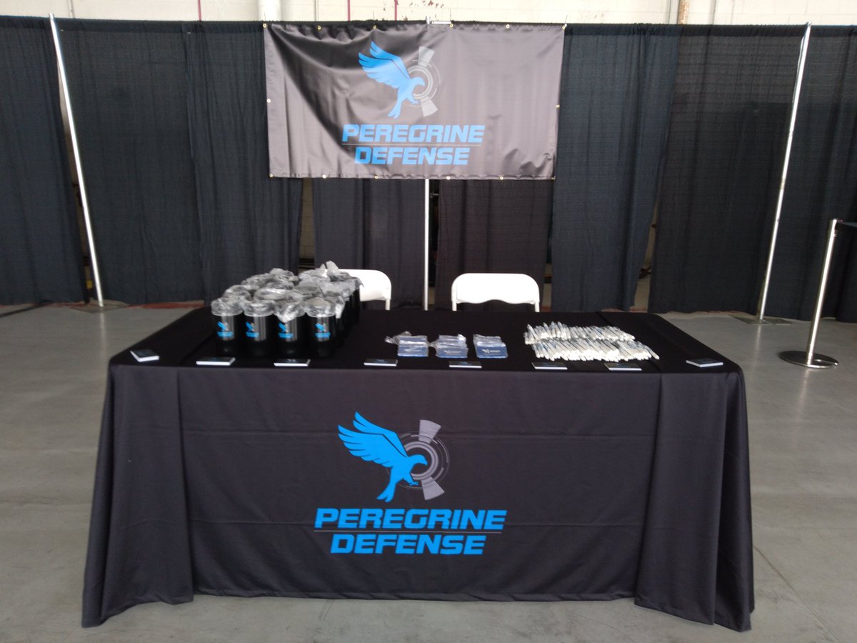 PeregrineDefen1's tweet photo. Come by our booth and say hi to Andy. Mugshot for a mug! https://t.co/70VK8ylwK9