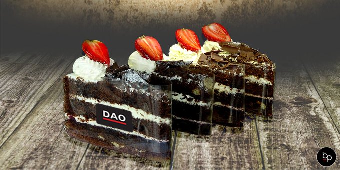 Slices of cake labeled with the BanklessDAO logo
