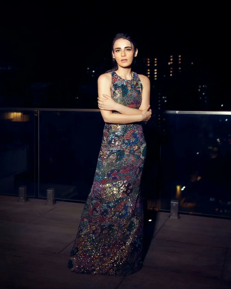 talkingbling's tweet photo. #RadhikaMadan, a luminous moon in her multicolored dress, casting a spell of beauty in the darkness. 🌙✨
. 
. 
. 
. 
#radhikamadan #CelebStyle #beauty #bollywoodfashion #fashionattire #divastyle #talkingbling https://t.co/1OHLifXdGE
